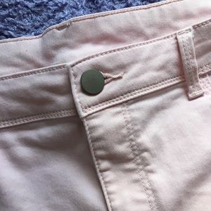 Baby pink skinny jeans